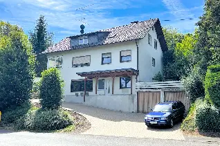 Wohnhaus mit drei Wohneinheiten und zwei Garagen Nähe Ruppichteroth